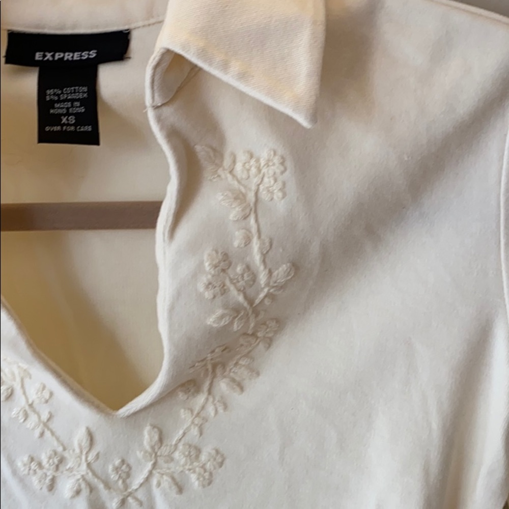 V neck 3 quarter length cream shirt